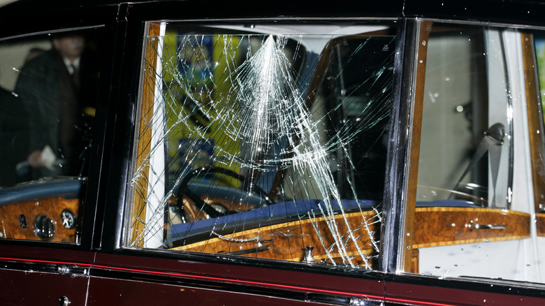 Cracked window of Rolls-Royce