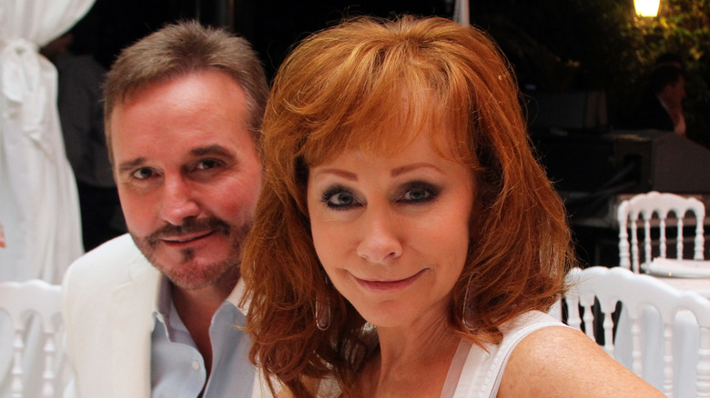 Narvel Blackstock and Reba McEntire smiling