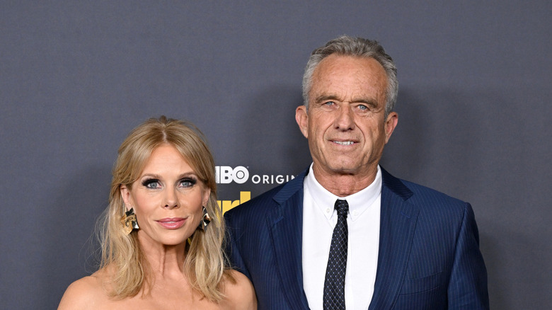 RFK Jr. and Cheryl Hines posing for photos