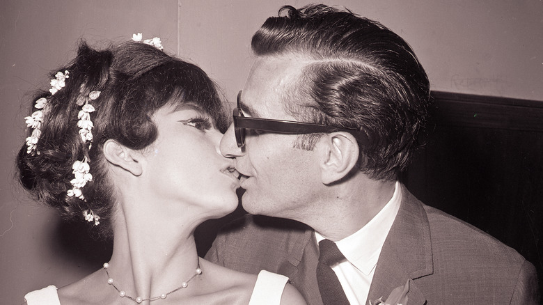 Rita Moreno and Leonard Gordon kissing 