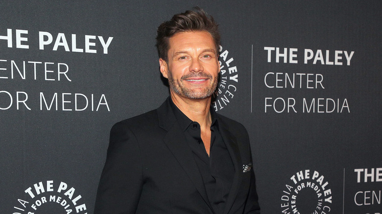 Ryan Seacrest posing at an event