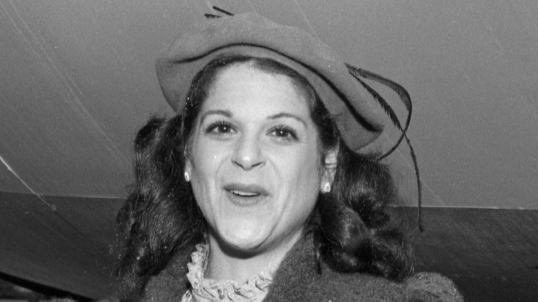 Black and white photo of Gilda Radner smiling