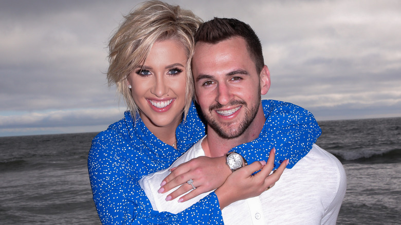 Savannah Chrisley hugging Nic Kerdiles