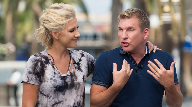 Savannah Chrisley comforting her dad, Todd Chrisley