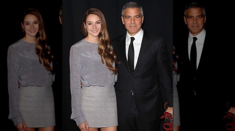 Shailene Woodley and George Clooney posing at an awards gala