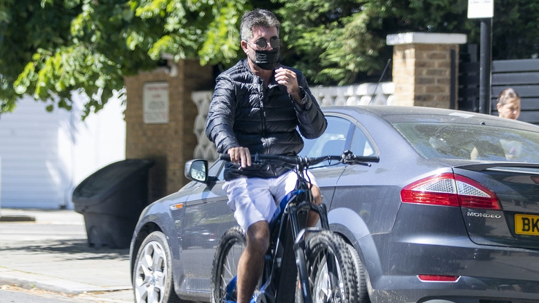 Simon Cowell riding his bicycle