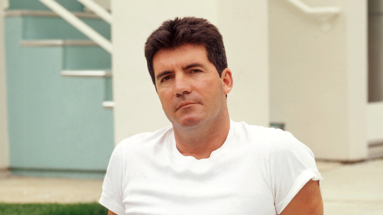 Simon Cowell wearing a white t-shirt