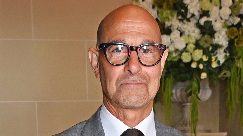 Stanley Tucci posing for photo