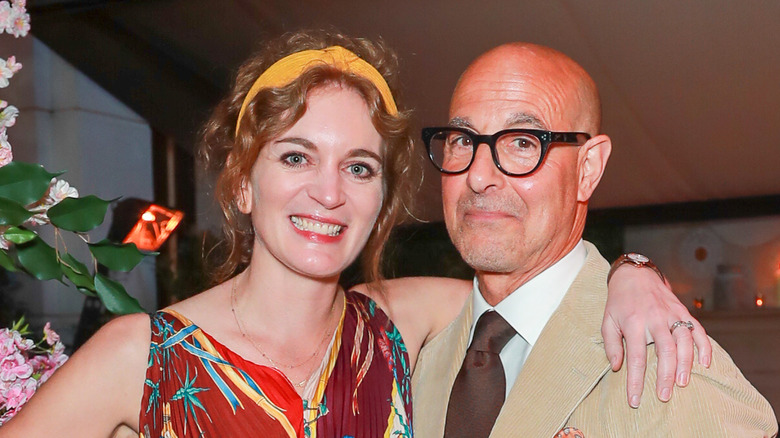 Stanley Tucci and Felicity Blunt smiling