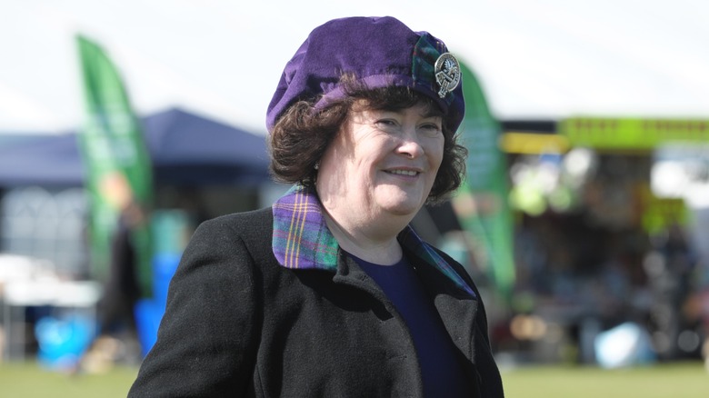 Susan Boyle smiling outdoors