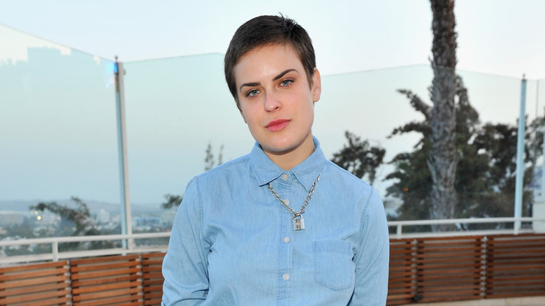 Tallulah Willis next to pool