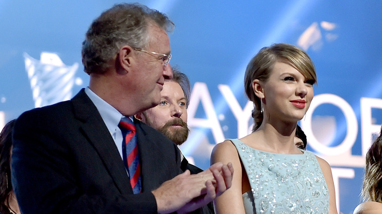 Taylor Swift and Scott Swift on stage 