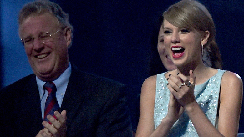 Scott and Taylor Swift laughing 