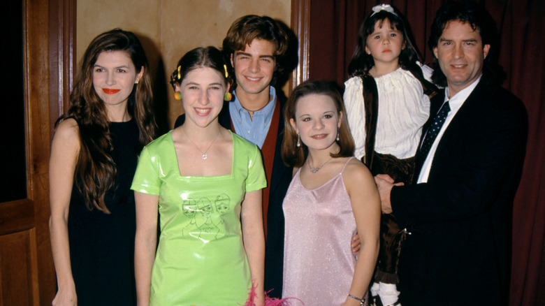 The cast of Blossom posing for photos