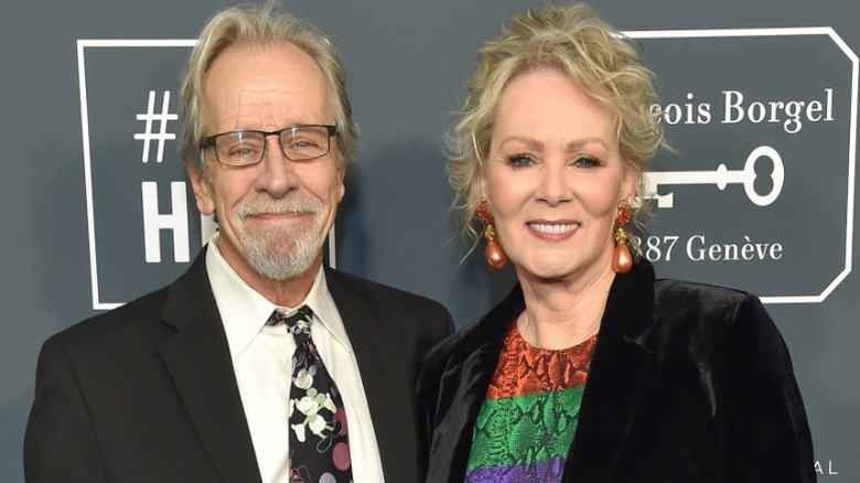 Richard Gilliland and wife Jean Smart smiled on the red carpet