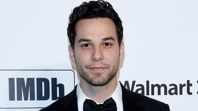 Skylar Astin posing 