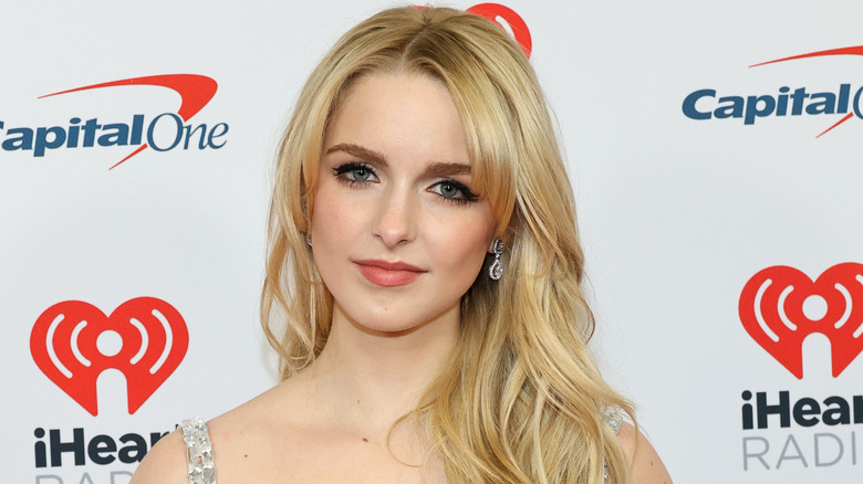 Mckenna Grace looking at the camera at a red carpet event