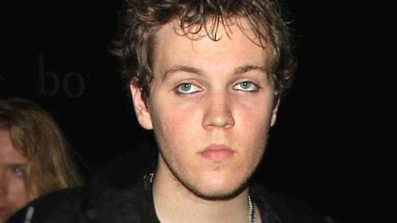 Benjamin Keough wearing eyeliner and nose stud