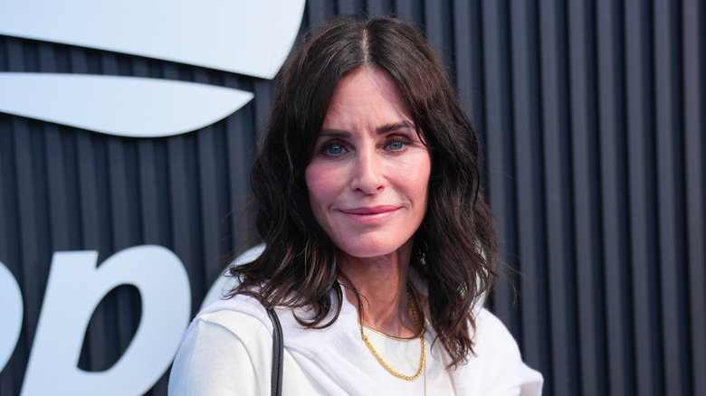 Courteney Cox looks into the camera