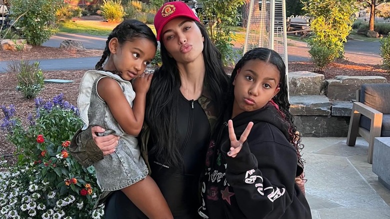 Kim Kardashian with her daughters