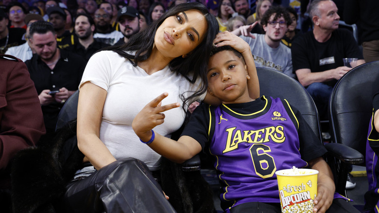 Kim Kardashian posing with her son Saint West