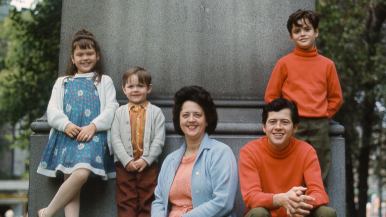 George Osmond with three kids