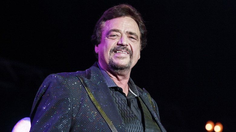 Jay Osmond onstage, smiling