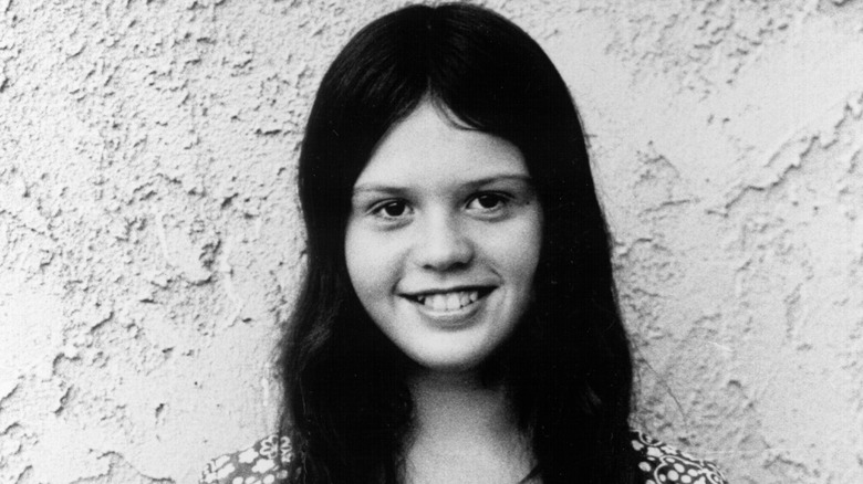 young Marie Osmond, smiling