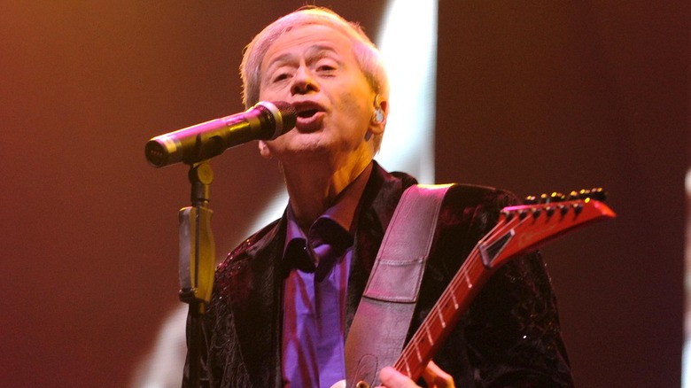 Wayne Osmond singing during concert