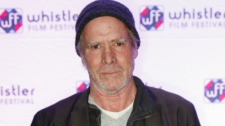 Will Patton looking straight into camera at a press event