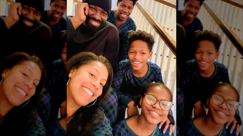 Sheinelle Jones poses with her husband and kids on Christmas