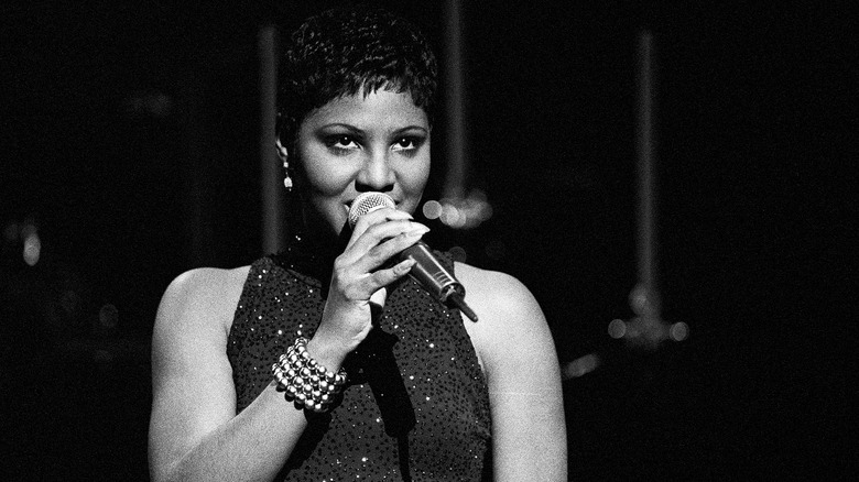 Toni Braxton wearing lace top