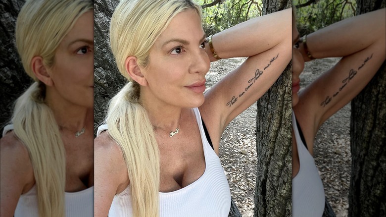 Tori Spelling selfie arm tattoo