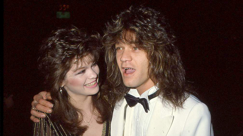 Valerie Bertinelli smiling at a white tuxedo-clad Eddie Van Halen