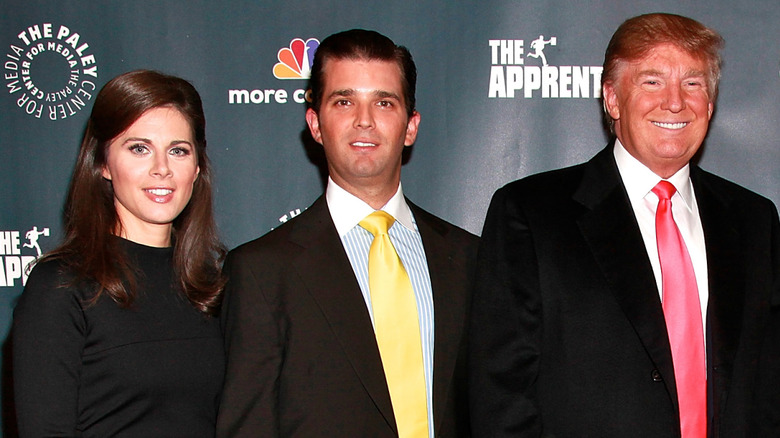 Erin Burnett with Donald Trump, Jr. and Donal Trump in 2010