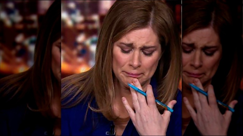 Erin Burnett cries while reporting