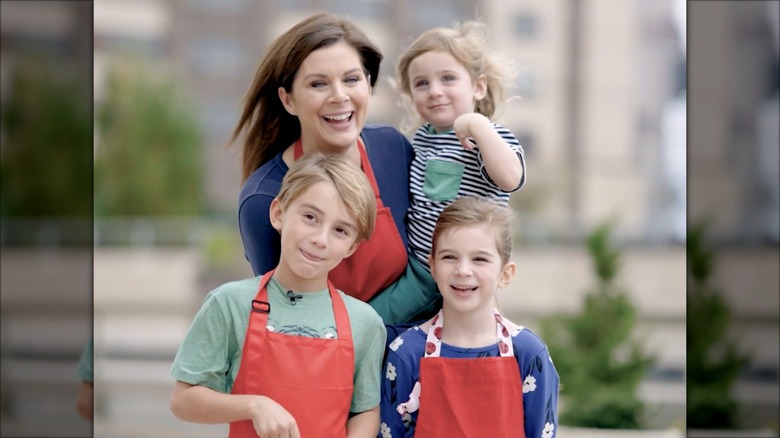 Erin Burnett laughs with her three kids