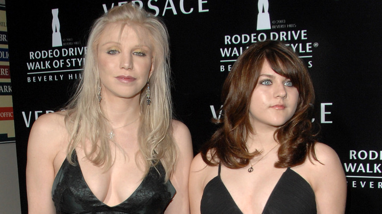 Courtney Love and young Frances Bean Cobain posing