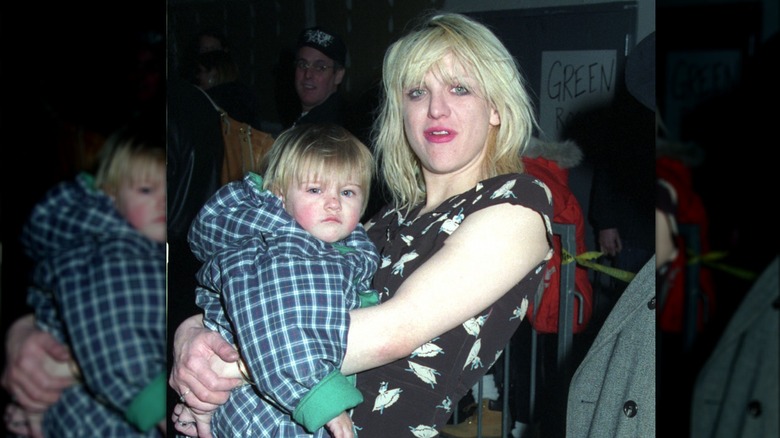 Baby Frances Bean and Courtney Love posing