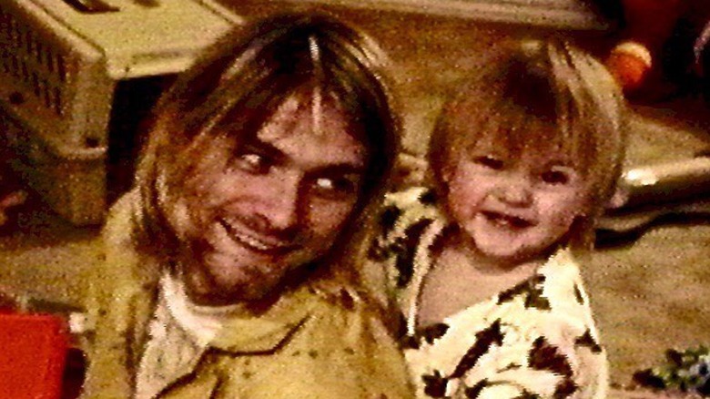 Kurt Cobain with baby Frances Bean Cobain