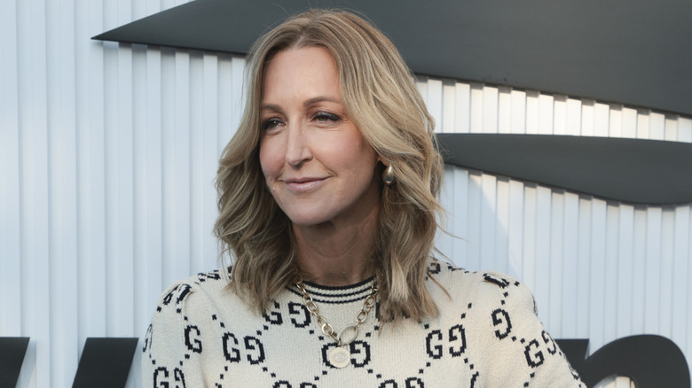 Lara Spencer posing on step-and-repeat