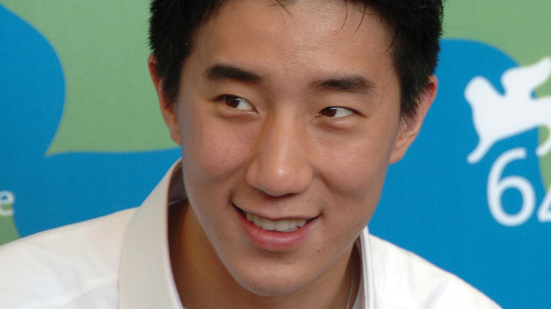 Jaycee Chan smiling at the Venice Film Festival