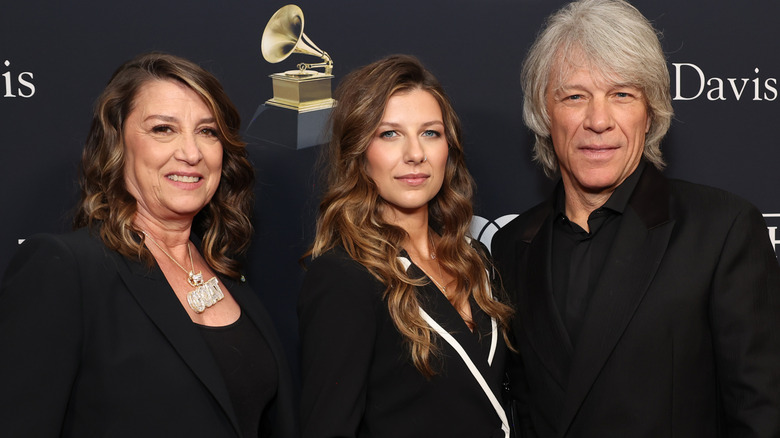 Jon Bon Jovi, Dorothea Hurley, and Stephanie Rose posing on step-and-repeat