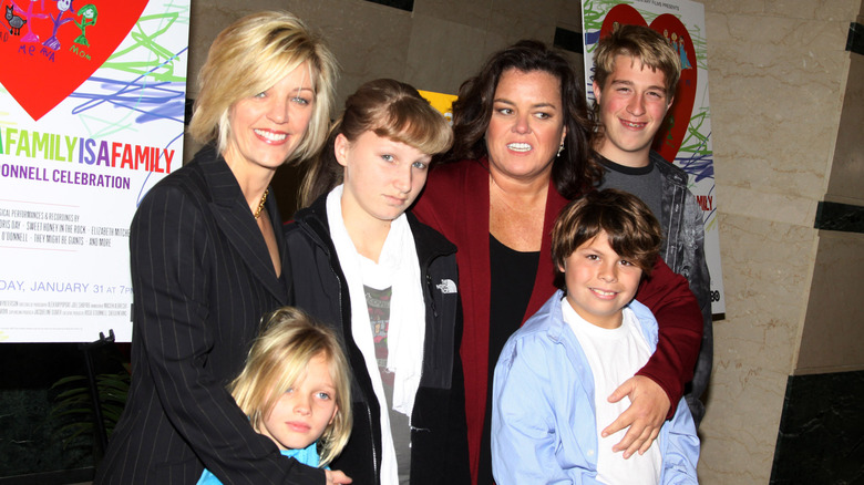 Chelsea O'Donnell as a teen with her adoptive mothers Rosie O'Donnell, and Kelli Carpenter, with siblings Parker, Blake, and Vivienne