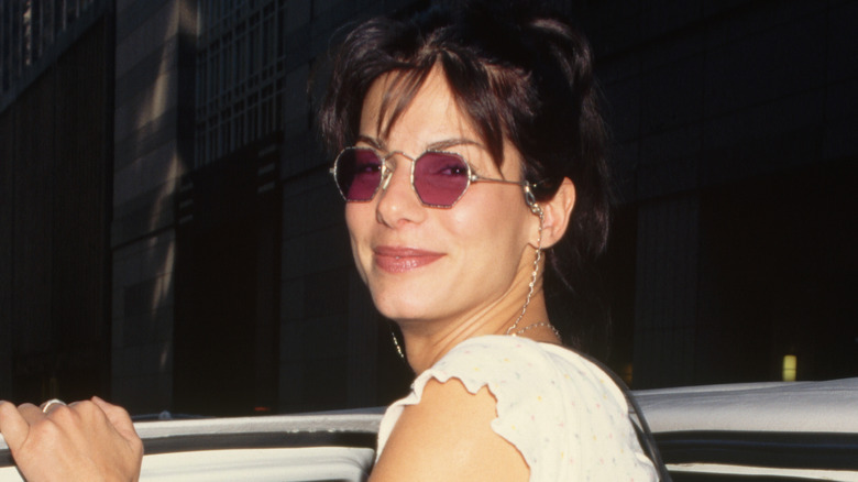 Sandra Bullock smiling, young