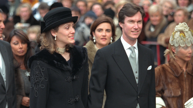Princess Sibilla and Prince Guillaume walking in a crowd