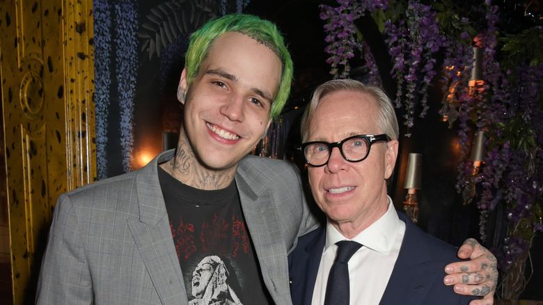 Richard Hilfiger and Tommy Hilfiger smiling