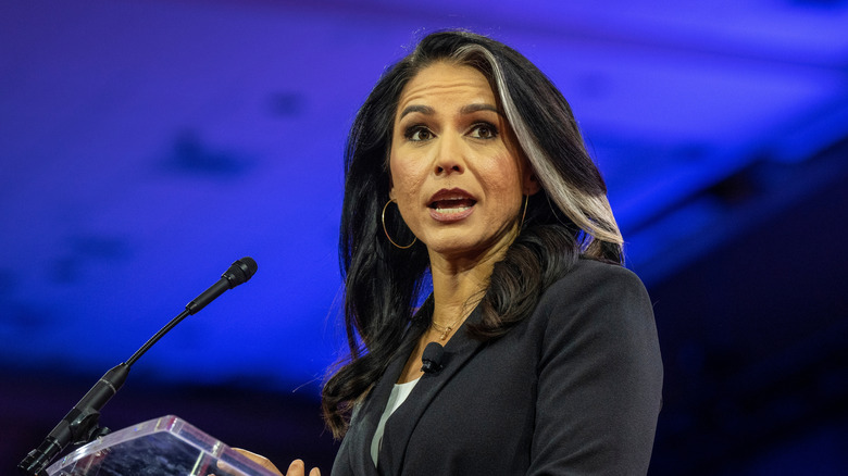 Tulsi Gabbard speaking at a podium