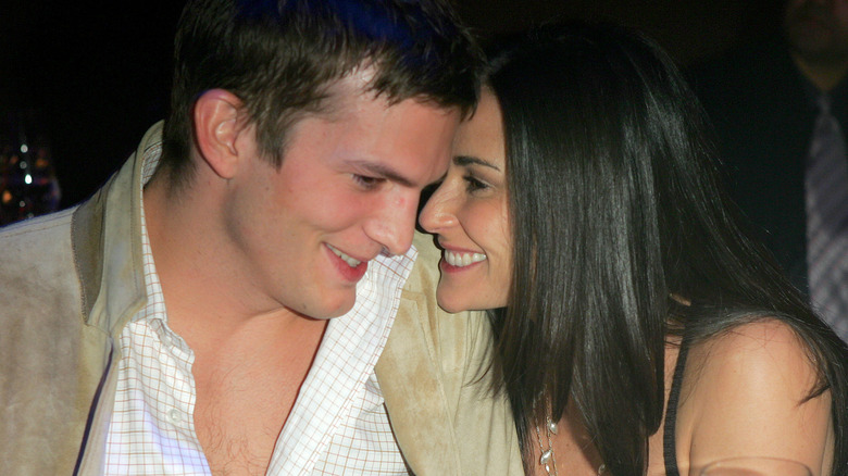 Ashton Kutcher and Demi Moore smiling