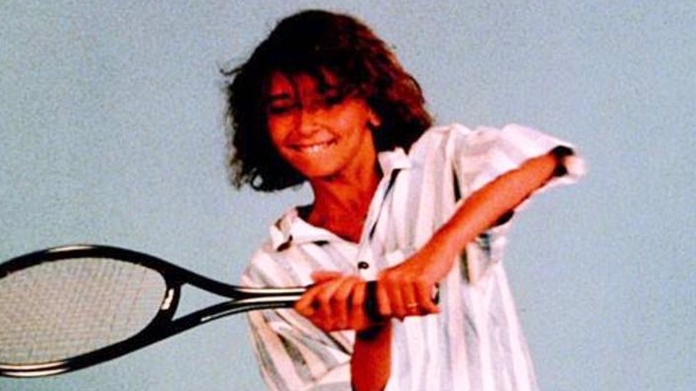 Young Giuliana Rancic playing tennis